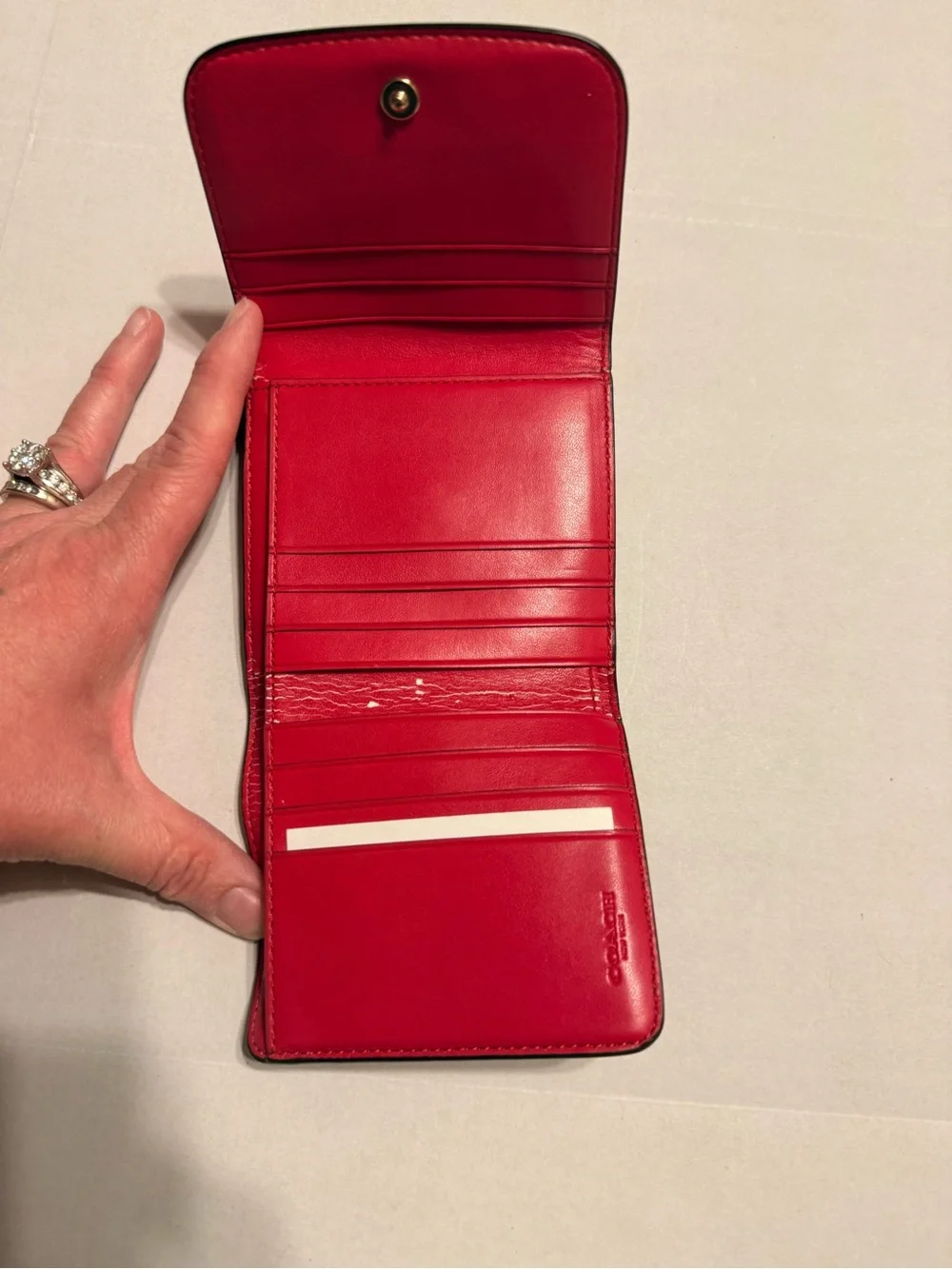 Coach Trifold Wallet in pink and Brown